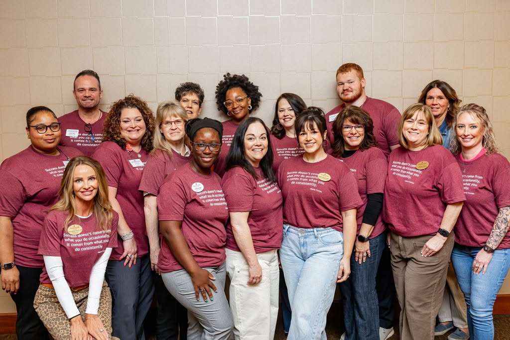 Group of Traditions employees during the annual company meeting